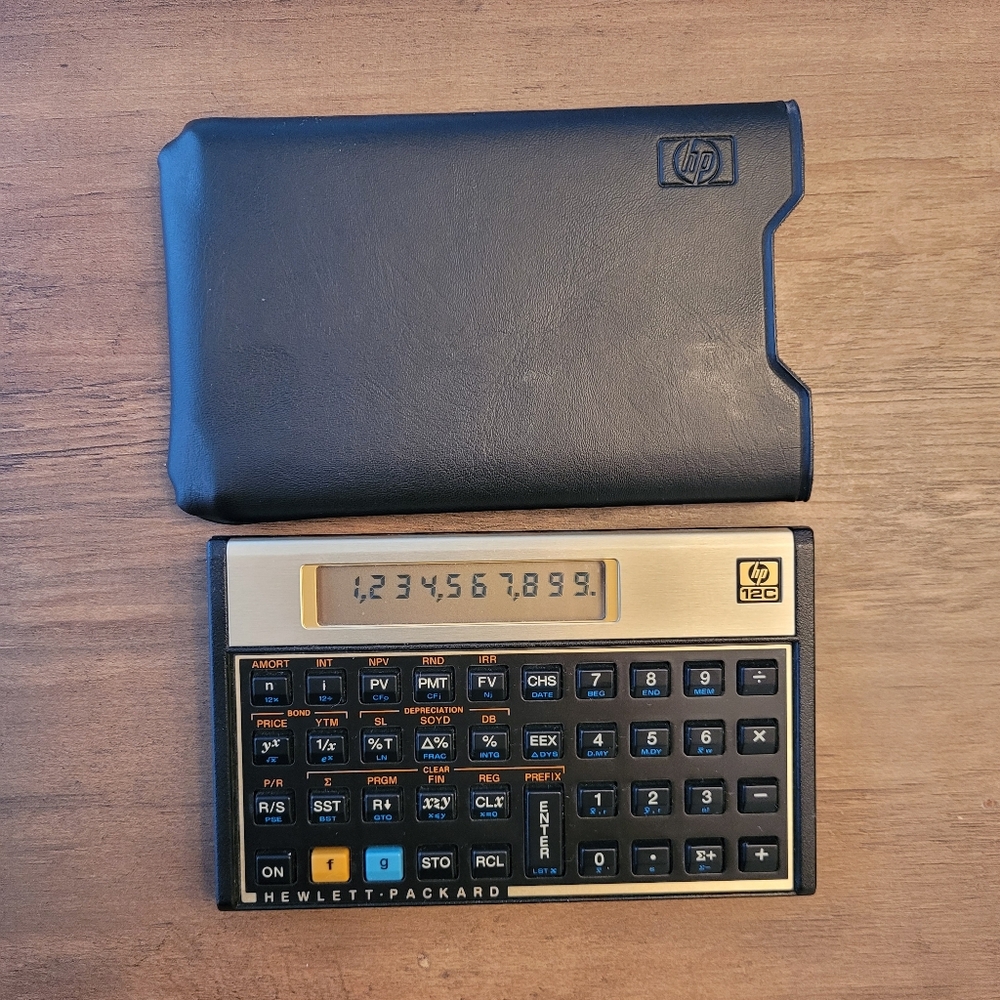 HP 12C Financial Calculator in Black and Gold With Case Hewlett-Packard